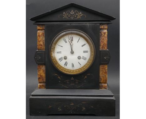 A late 19th century slate and marble mantel clock with architectural pediment and enamel white dial with Roman numerals. H.30