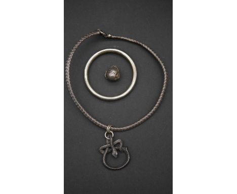 A collection of silver jewellery. Including a woven silver Italian necklace with coiled snake pendant, a silver hollow bangle