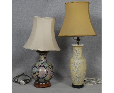 A baluster shaped Chinese style table lamp and shade along with a similar example. H.83cm 