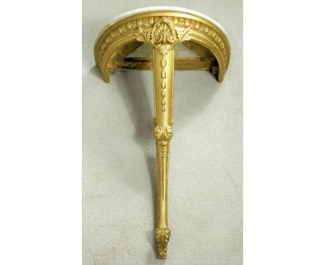 A carved giltwood marble topped console table with shell and foliate decoration. H.75 W.47 D.32cm 