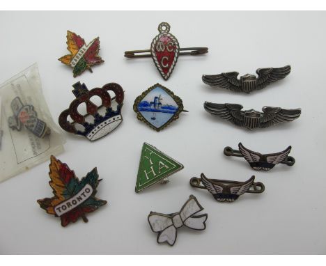 Enamel and Other Pin Badges, including American Air Force wings brooches, stamped "Sterling", 'Canada' and 'Toronto' souvenir
