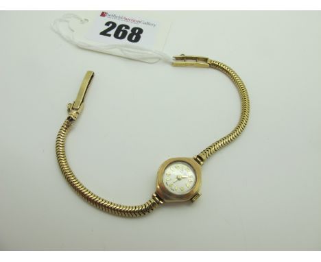 Bentima Star; A 9ct Gold Cased Ladies Wristwatch, the signed dial with Arabic numerals and dagger markers, within plain case 