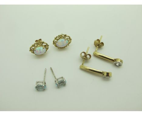 A Pair of Modern Opal Single Stone Earstuds, a pair of modern 9ct white gold single stone earstuds, and another pair. (3) 