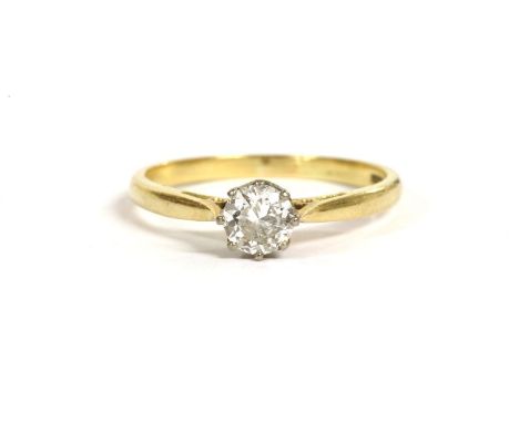 A gold single stone diamond ring,  a brilliant cut diamond claw set to chenier shoulders and a plain polished shank, marked 1