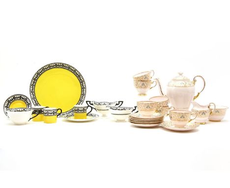 A 1930s six place Tuscan china coffee set, together with a Royal Worcester part set with yellow ground and black banding
