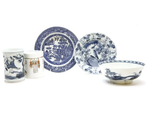 A collection of Chinese blue and white porcelain, comprising a Kangxi style jardiniere, a bowl, a vase and cover, various pla