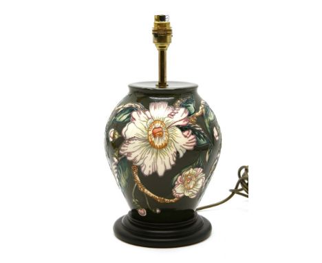 A Moorcroft table lamp, 35cm high to top fitting