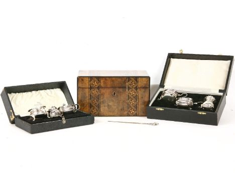 A 19th century walnut Tunbridge ware tea caddy, together with two cased silver cruet sets and a silver bookmark (Qty.)