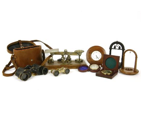 A set of Edwardian postal scales, 26cm wide, an eight day pocket watch in an easel back frame, 12cm, a pocket barometer, 5cm 