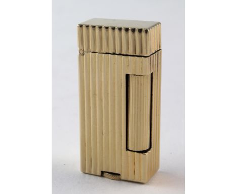 Dunhill Lighter, stamped to base 'Dunhill U.S. Pat 2102108, Outer Jacket 14K Gold', length 52mm approx.(untested)