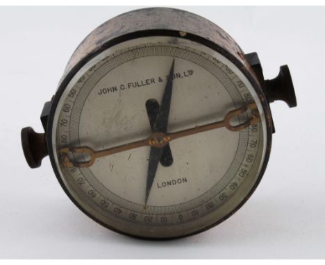 Brass cased bearing indicator compass by John C. Fuller & Son Ltd, diameter 85mm approx.