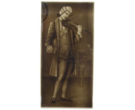 Sherwin & Cotton dark brown majolica glazed picture tile, circa late 19th to early 20th century, depicting a gentleman playin