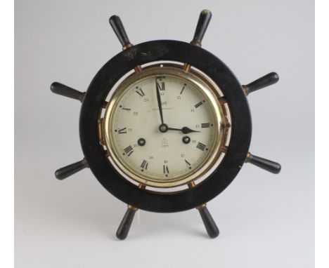 Schatz Royal Mariner brass 8 Day clock with ships wheel surround