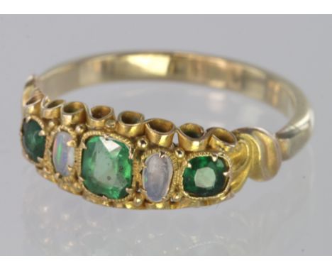 Yellow Metal (tests 10ct) Emerald and Opal Ring weight 2.0g