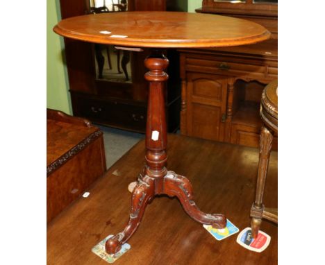 Carved mahogany tripod table