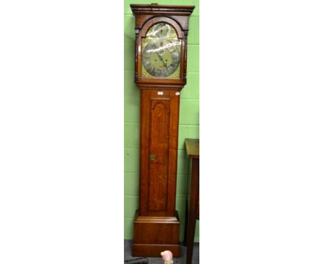 A George III oak eight day longcase clock, the silvered chapter ring signed Isaac Debnam, Warminster, strikes silent, subsidi