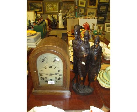 Oak Mantel Clock and a Carved Wood African Figure Group 