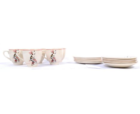 A set of 5 mid century Royal Art Pottery porcelain tea service having unusual tribal dancing motif's and being stamped to the