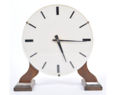 Camerer Cuss &amp; Co - A 1930’s Art Deco Camerer Cuss &amp; Co of London WC1 mantel clock, The circular dial with white face