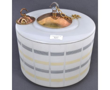 A large mid century art glass ceiling lamp. Of cylindrical form in white glass with geometric patterns&nbsp; in black and yel