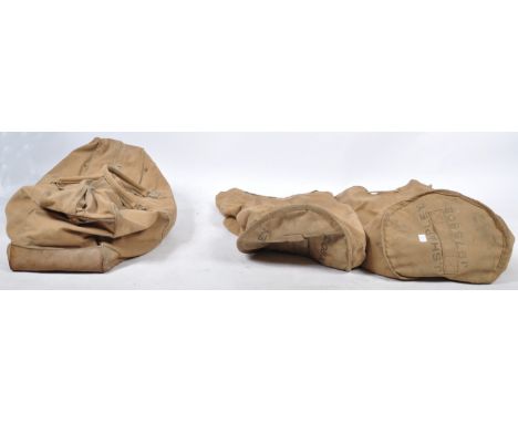 A collection of 3x early 20th century military issue canvas soldiers bags / duffle bags. To include 2 duffle bags with notati