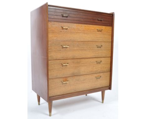 A vintage retro 20th Century teak wood pedestal chest of drawers. The upright pedestal chest being raise don tapering legs ha