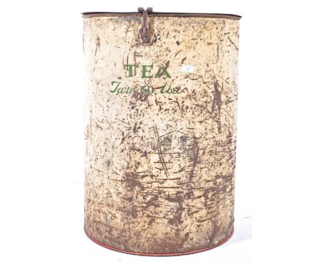 A mid century Industrial warehouse cylindrical extra large tea bin caddy. The bin with original paintwork and notation in gre