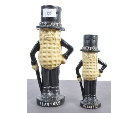 A set of two contemporary 20th century vintage style ' Mr Peanut ' cast iron money boxes each with hand painted finish and no