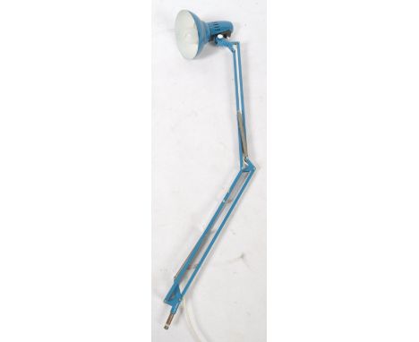 A mid century Scandinavian Industrial anglepoise desk lamp. The blue colourway lamp with adjustable arm set to a bracket base