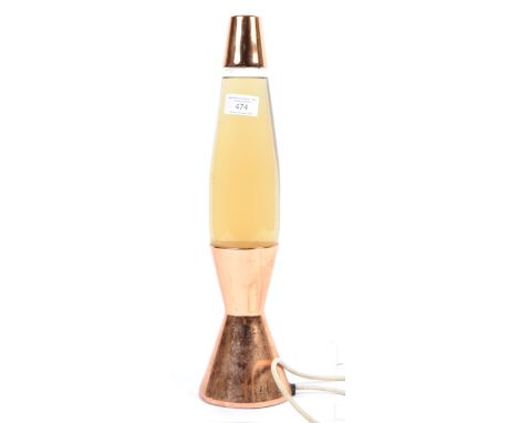 A retro mid century Crestworth lava lamp having copper plated base with glass lava lamp upper. The base marked for Crestworth