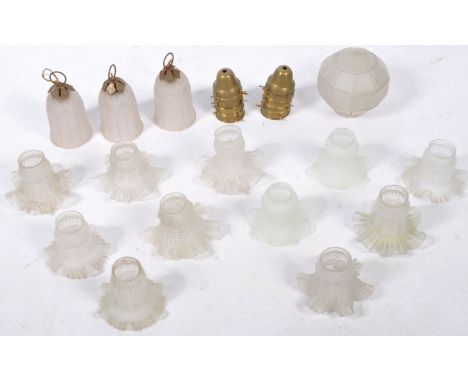 A collection of 20th century retro glass light shades to include a 1930's Art Deco frosted glass globe, 3 Art Nouveau lantern