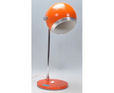 A vintage retro 1970's desk&nbsp; ' Eyeball Lamp ' / light having an orb shaped eyeball shade raised on a tubular chrome supp