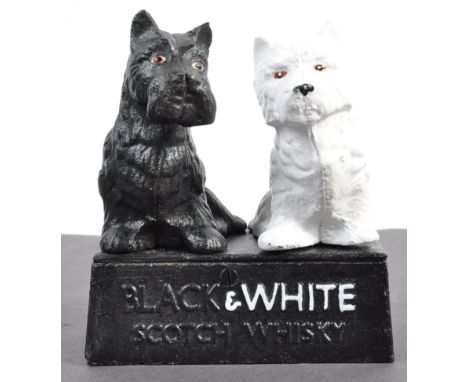 Black &amp; White Whiskey - A 20th century cast iron Black &amp; White Scotch Whisky pub / shop display type ornament / figur