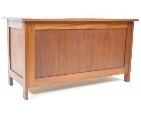 Danish Mid Century Design - A mid 20th century Danish teak wood blanket box chest. The chest being raised on stile legs with 