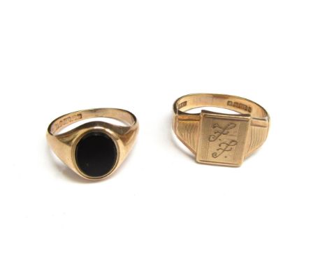 A 9ct gold signet ring, monogrammed, size U/V, 5.2g and a 9ct gold black onyx signet ring, size O, 3.6g (2) 