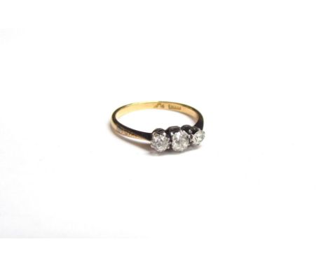 An 18ct gold platinum set three stone diamond ring, 0.40ct total approx. Size L, 2g 