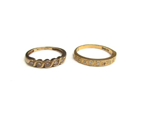 A 9ct gold diamond half hoop ring, size M/N, 1.7g and an 18ct gold diamond half hoop, size R, 2.8g (2) 