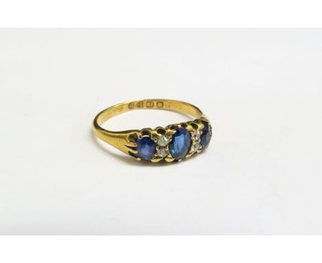 An 18ct gold late 19th Century sapphire and diamond ring, Chester hallmarks. Size P, 2.7g 