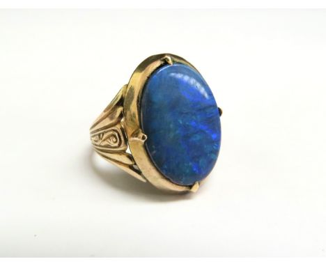 A gold oval opal doublet ring, stamped 14k. Size J/K, 4.7g 