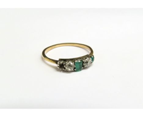 An emerald and diamond ring, unmarked gold, end emerald missing. Size P, 1.9g 