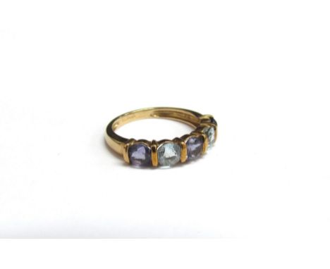 A 9ct gold aquamarine and tanzanite five stone ring. Size J, 1.7g 