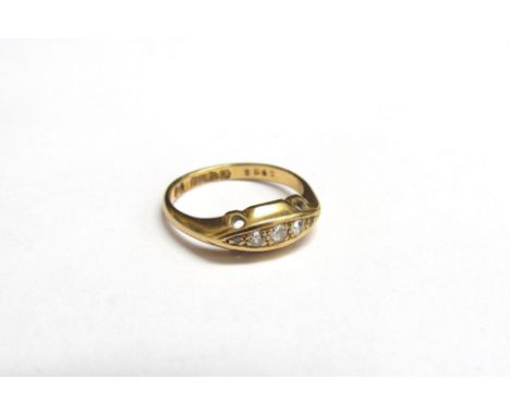 An 18ct gold ring set with five graduated old cut diamonds, Chester 1916. Size M, 2.7g 