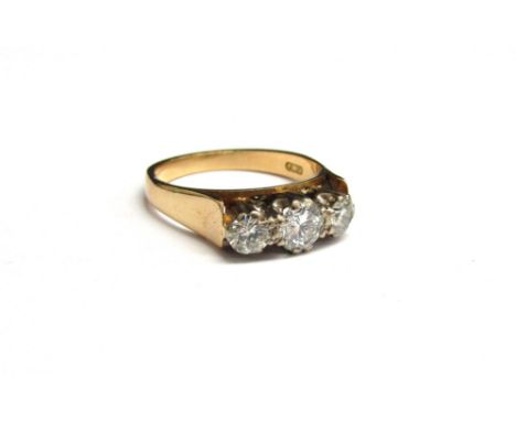 An 18ct gold platinum three stone diamond ring, 1ct diamond total approx. Size J/K, 2.5g 