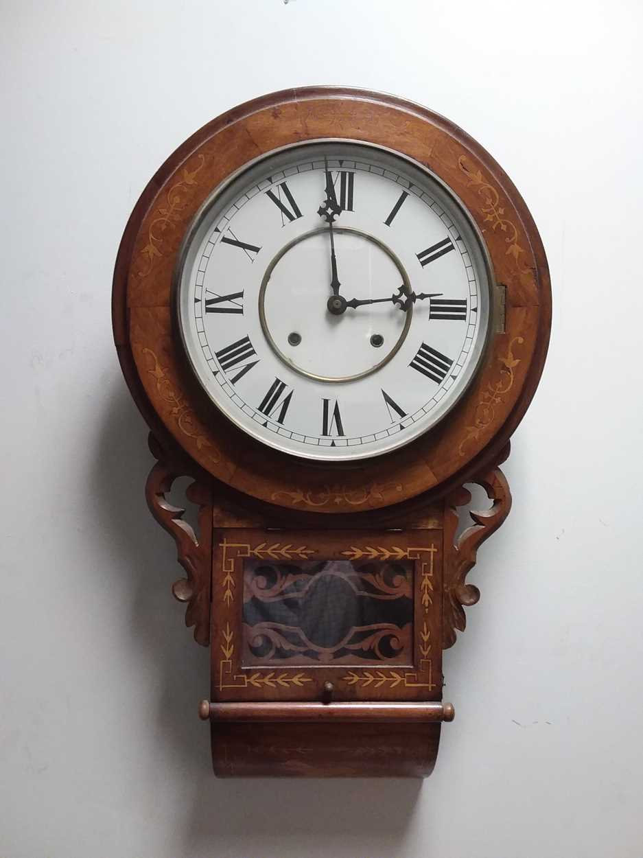A late Victorian American walnut case drop dial wall clock, in