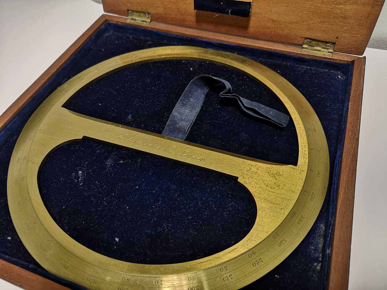 A brass protractor by Elliott, London, in Cheffins Fine Art