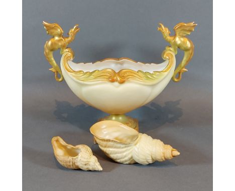 A Royal Worcester blush ivory two handled comport 17cms tall together with two Royal Worcester small vases in the form of con