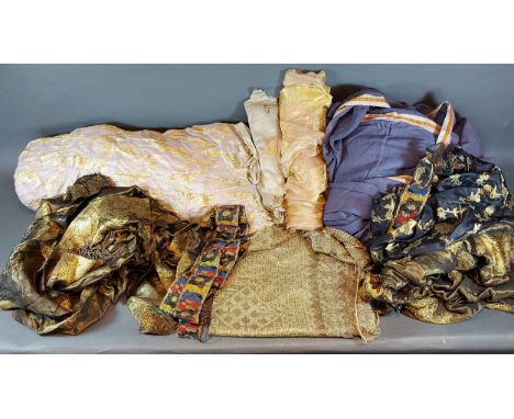 A metal embroidered shawl together with other similar fabrics 