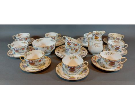 A Royal Worcester Peking pattern part tea service, comprising of eleven cups, seven saucers, three cake plates, a cream jug a