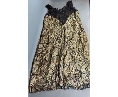 A gold thread and black lace dress together with a beaded and lace work shawl 