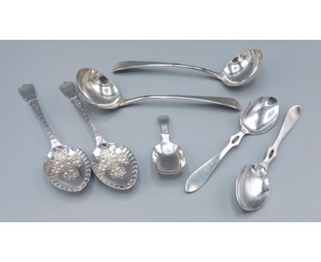 A pair of George III silver ladles, London 1803, makers Samuel Godbehere, Edward Wigan and James Boult, together with a Birmi
